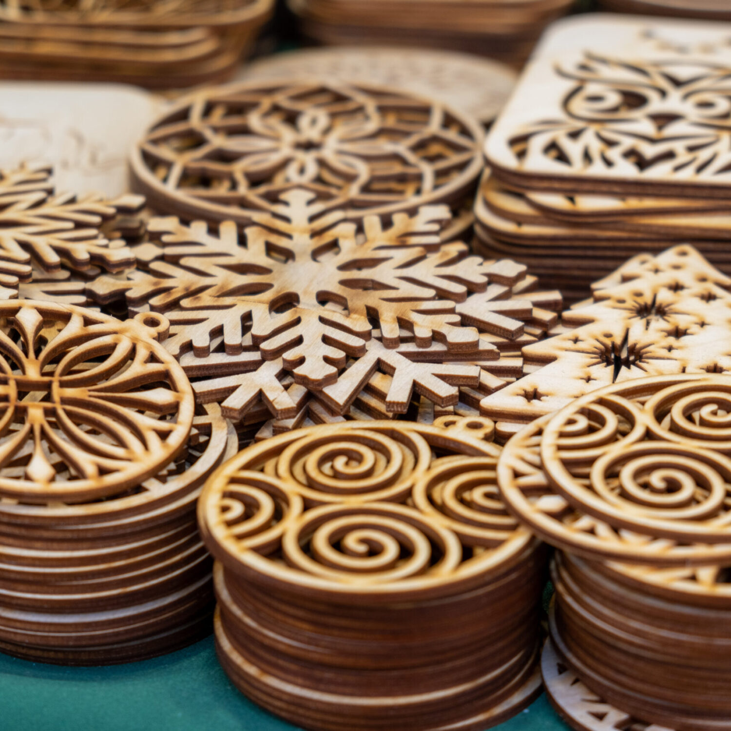 Laser cut wood christmas coasters sold at Christmas market.Poland